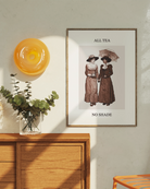 A poster with two sapphic ladies, walking together, holding hands under an umbrella, drinking tea with the text 'All Tea No Shade'.