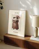 A poster with two sapphic ladies, walking together, holding hands under an umbrella, drinking tea with the text 'All Tea No Shade'.