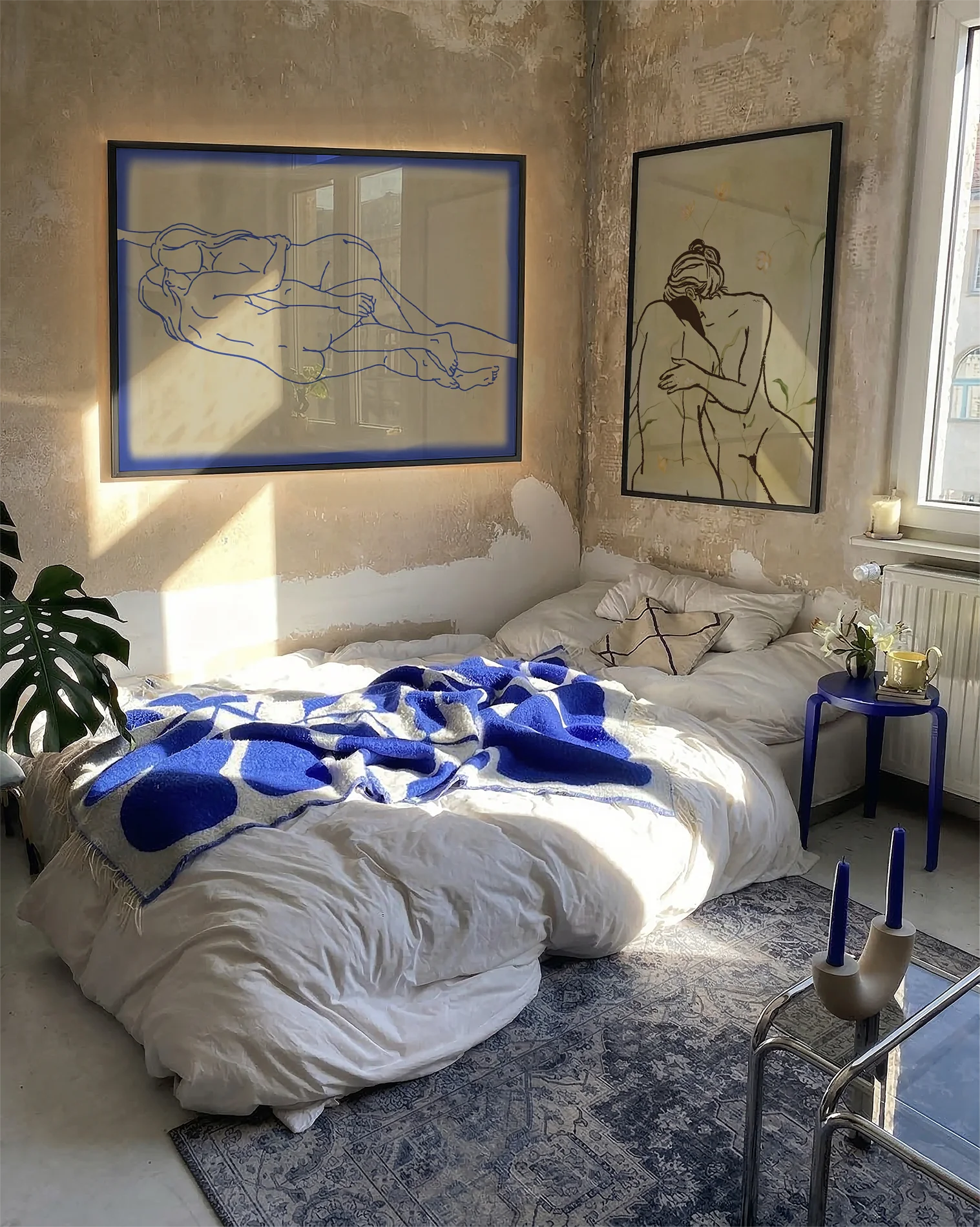 The poster shows two naked women in line art, lying down horizontally, holding each other.