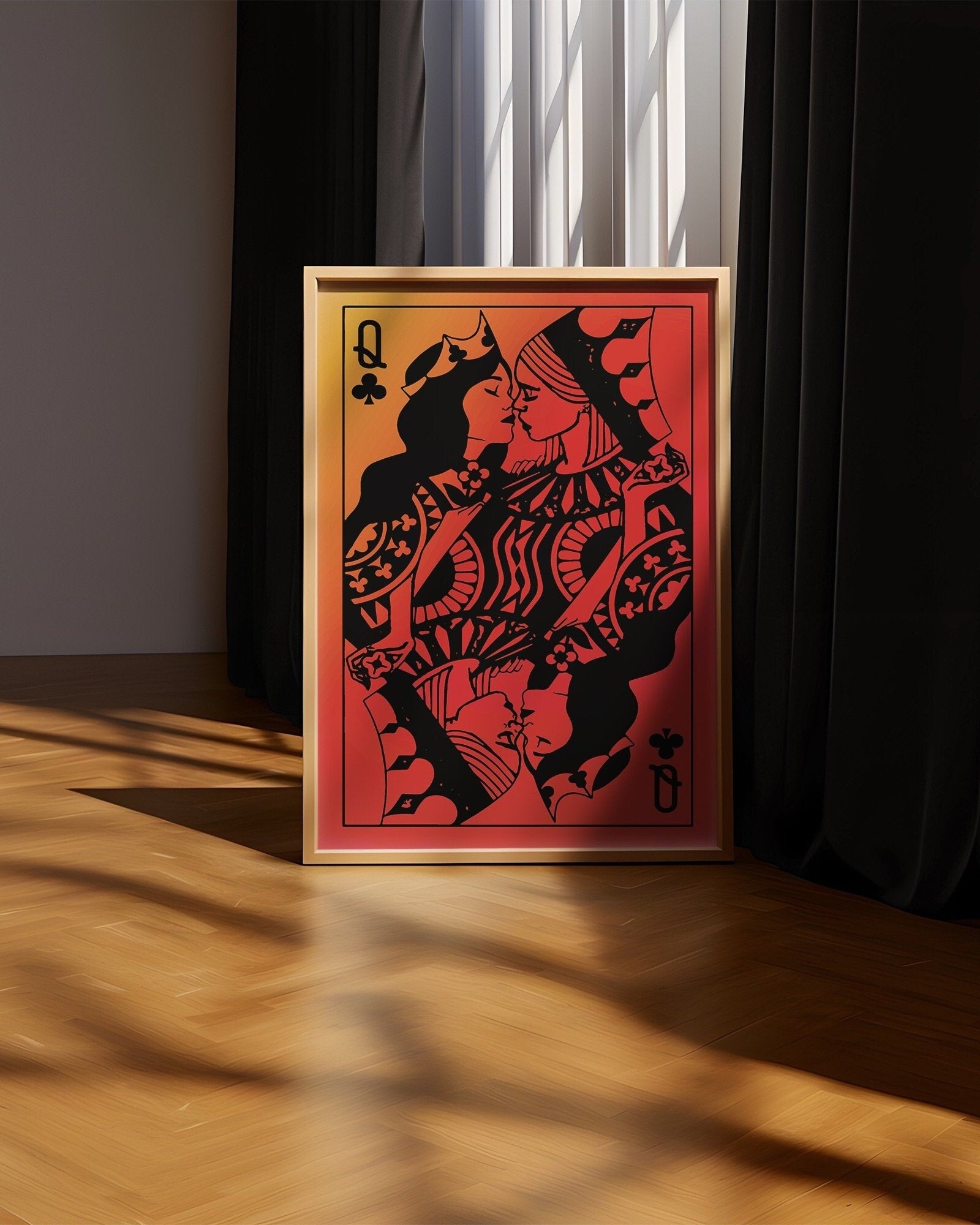 A poster with a sapphic couple kissing, card deck style. Two queens. Red background.