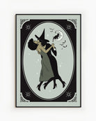 A poster with a lesbian witch couple kissing.