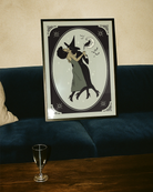 A poster with a lesbian witch couple kissing.