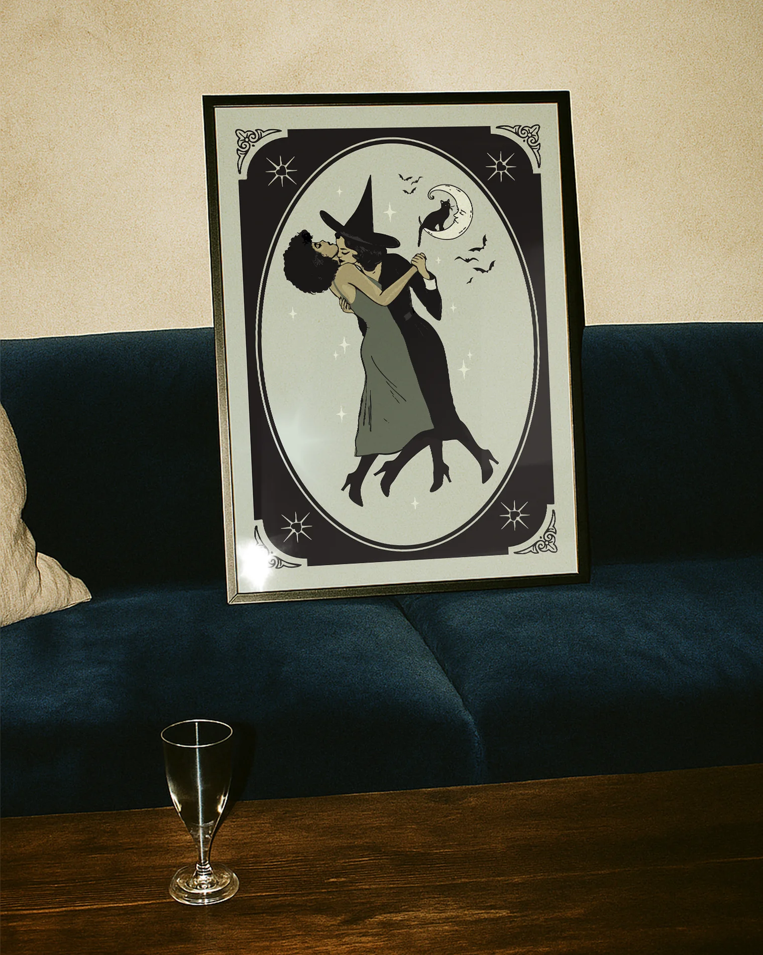 A poster with a lesbian witch couple kissing.