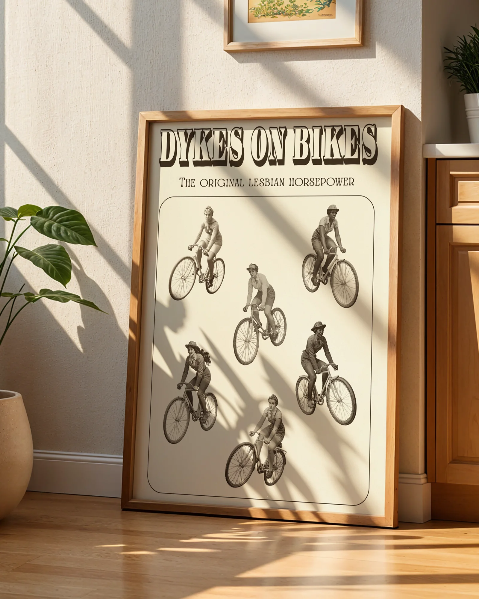 A poster featuring six lesbian women riding bicycles in a 1940s style, with the text: “DYKES ON BIKES” and “THE ORIGINAL LESBIAN HORSEPOWER.”