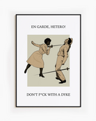 A poster with a woman fencing a man, with the text: "EN GARDE, HETERO! DON'T FUCK WITH A DYKE."