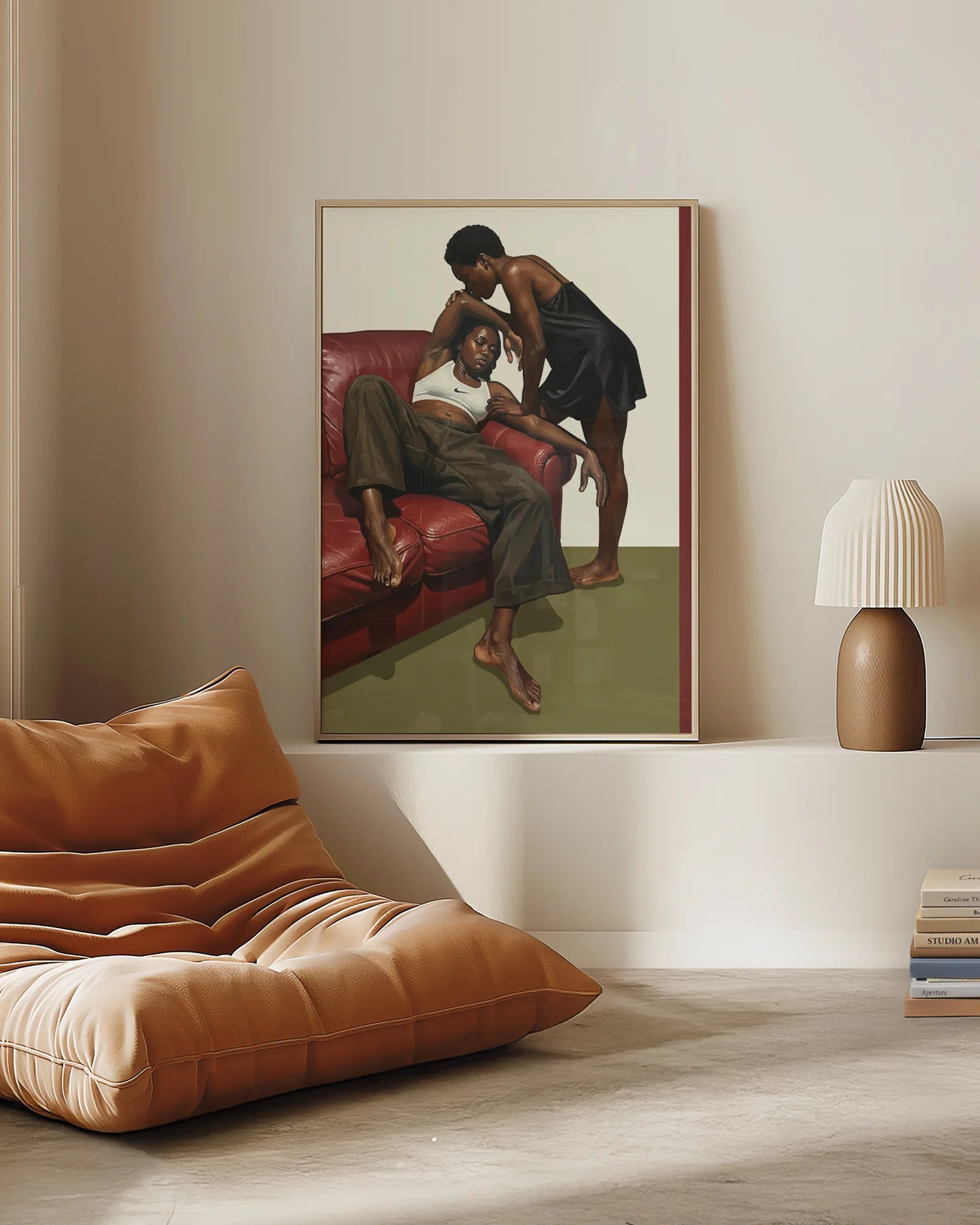 A framed poster with a black, lesbian couple kissing.