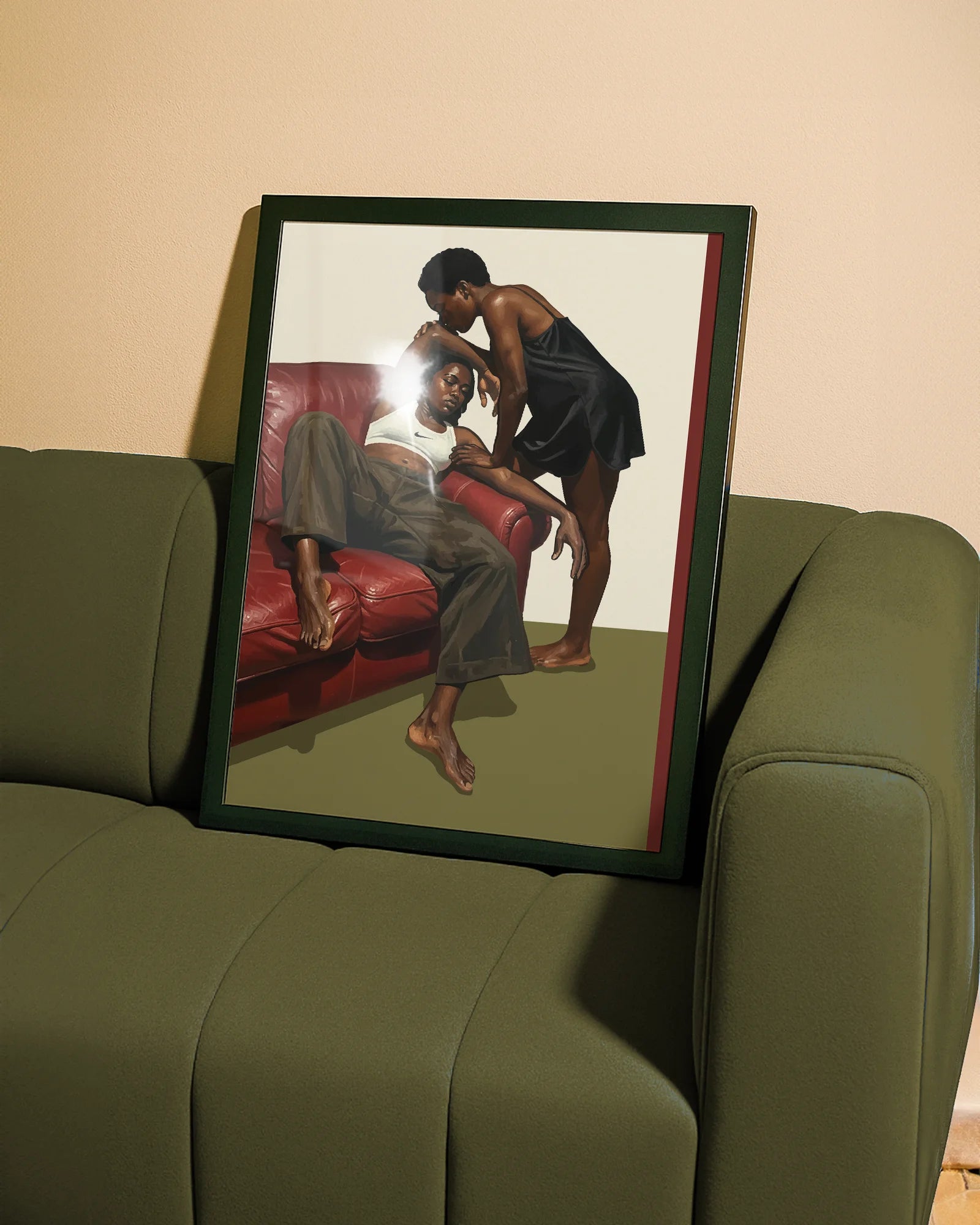 A framed poster with a black, lesbian couple kissing.