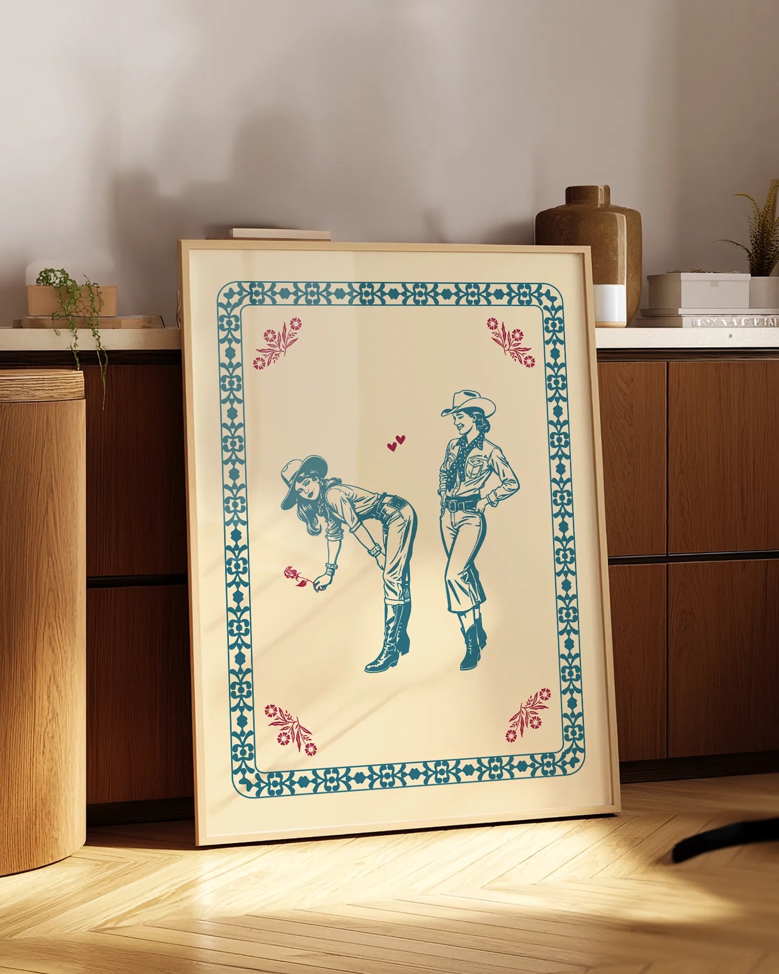 A print with a lesbian cowgirl couple flirting.
