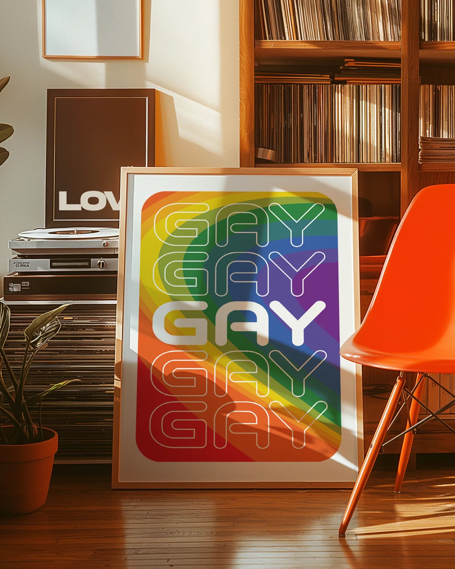 A print with a prideflag in a wavy form, with the text GAY times five.