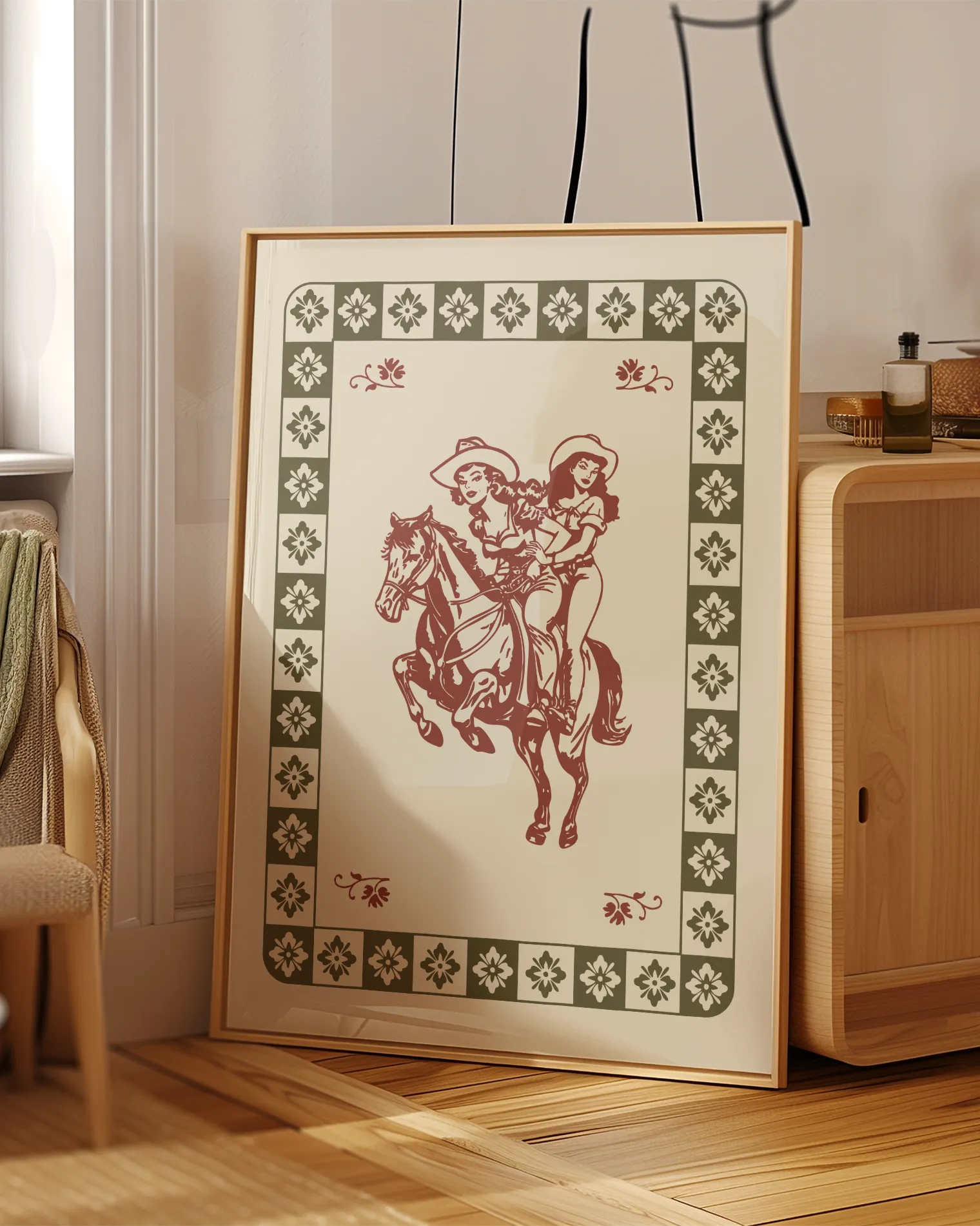 A poster with an illustrated lesbian cowgirls-couple riding a horse.