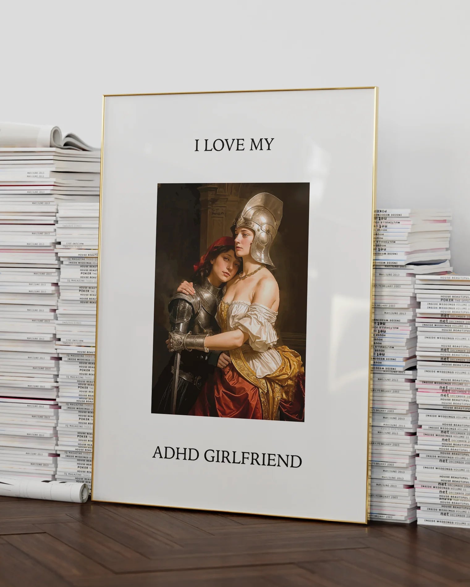 A poster showing a woman leaning against her girlfriend’s chest, both dressed in silver armor, with the text: “I LOVE MY ADHD GIRLFRIEND.”