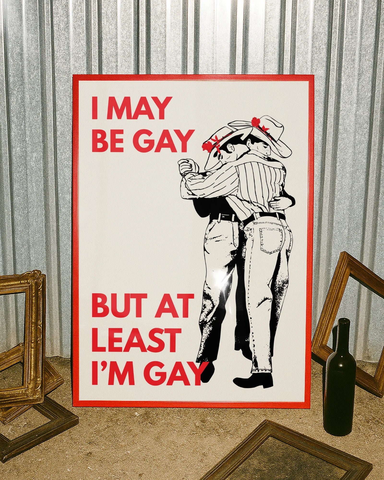 A poster with two illustrated, slow dancing cowboys with the text 'I May Be Gay But At Least I'm Gay'.