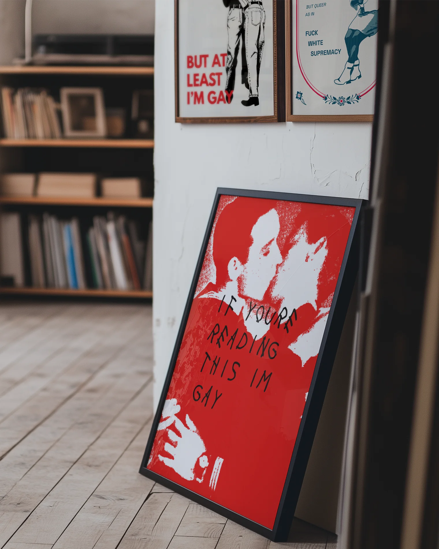 A poster with two illustrated men in uniforms kissing, with the text 'If you're reading this I'm gay'.