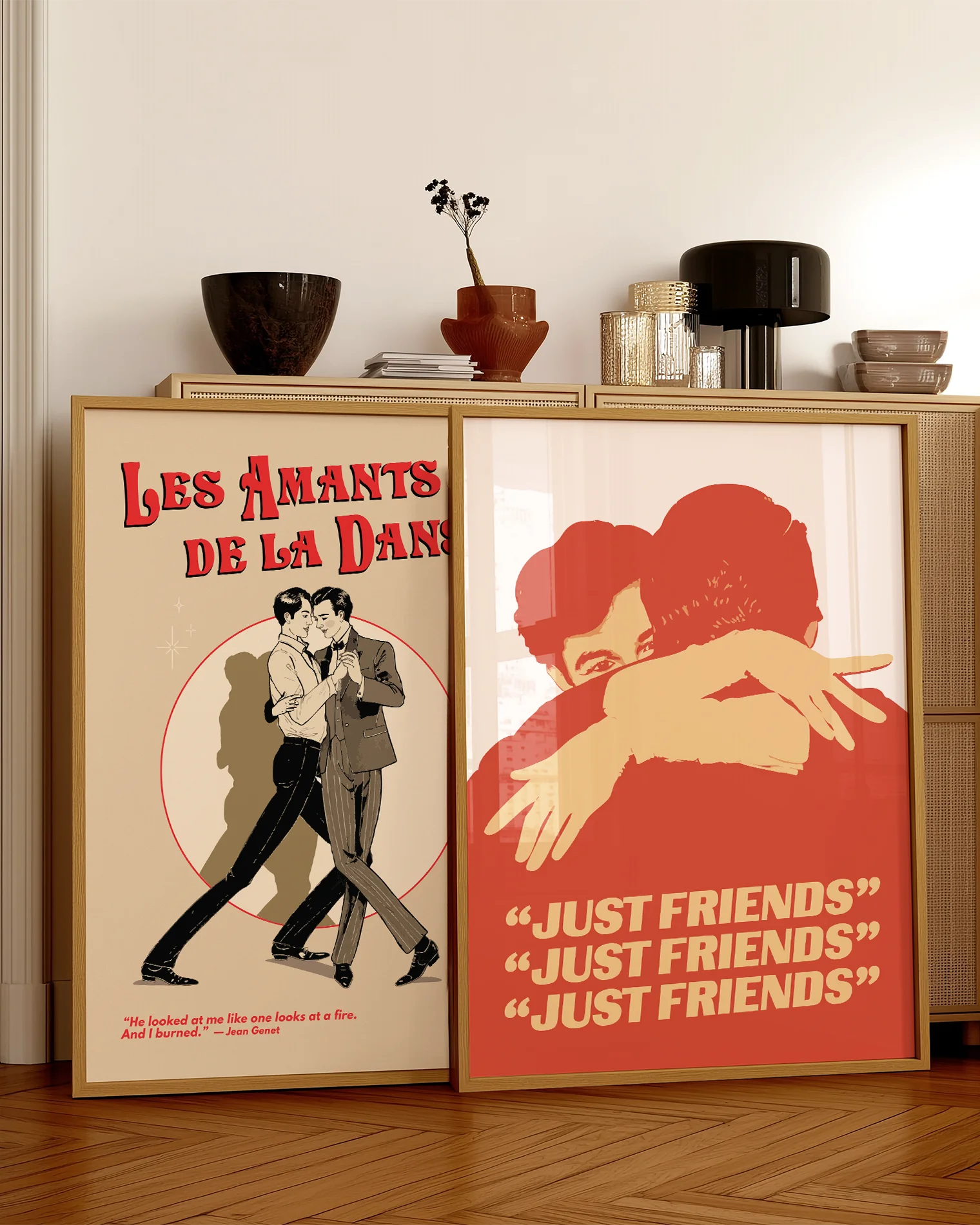A poster with two illustrated, gay men hugging tight, with the text 'JUST FRIENDS'.