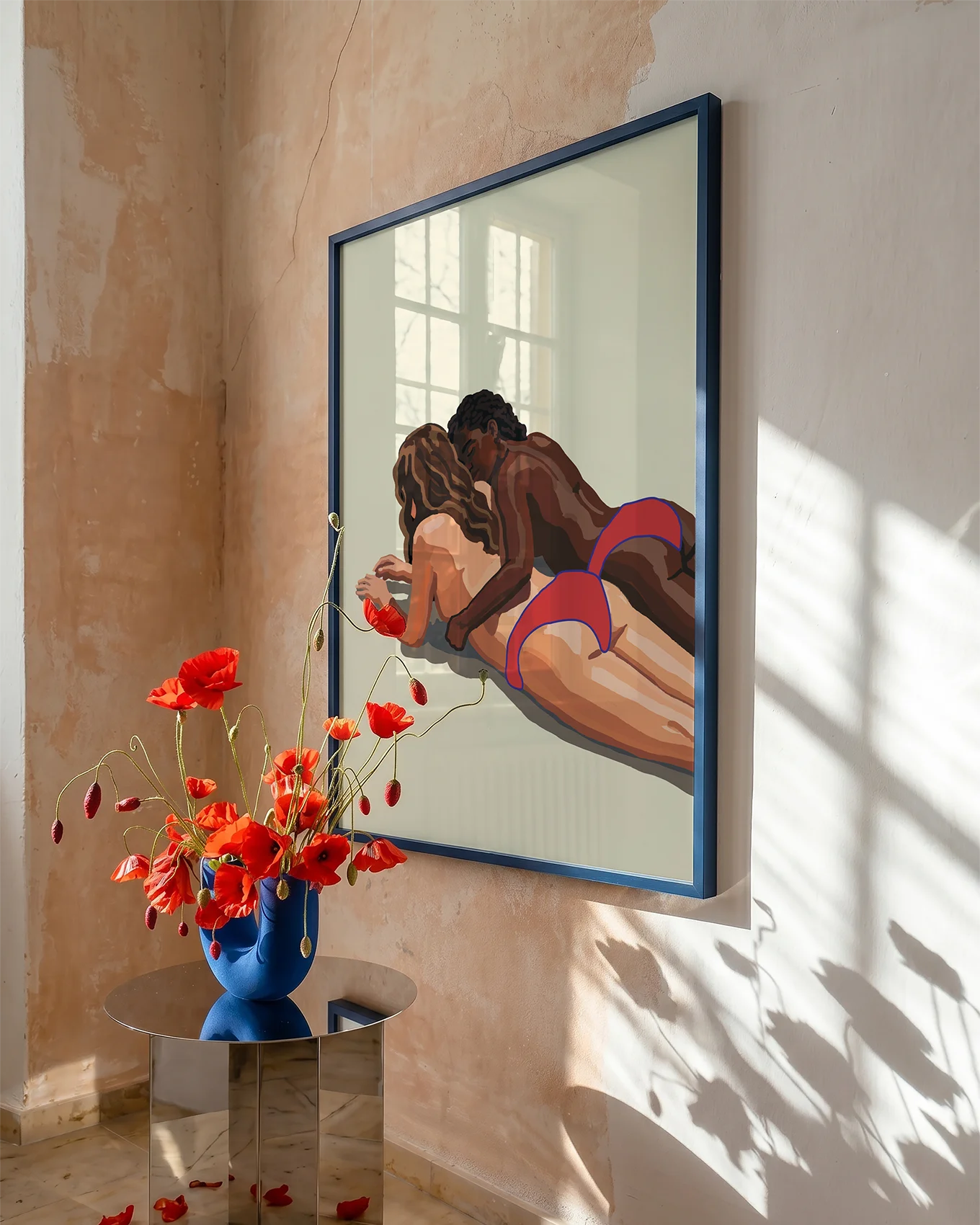 A poster with two lesbian girls cuddling on the beach.