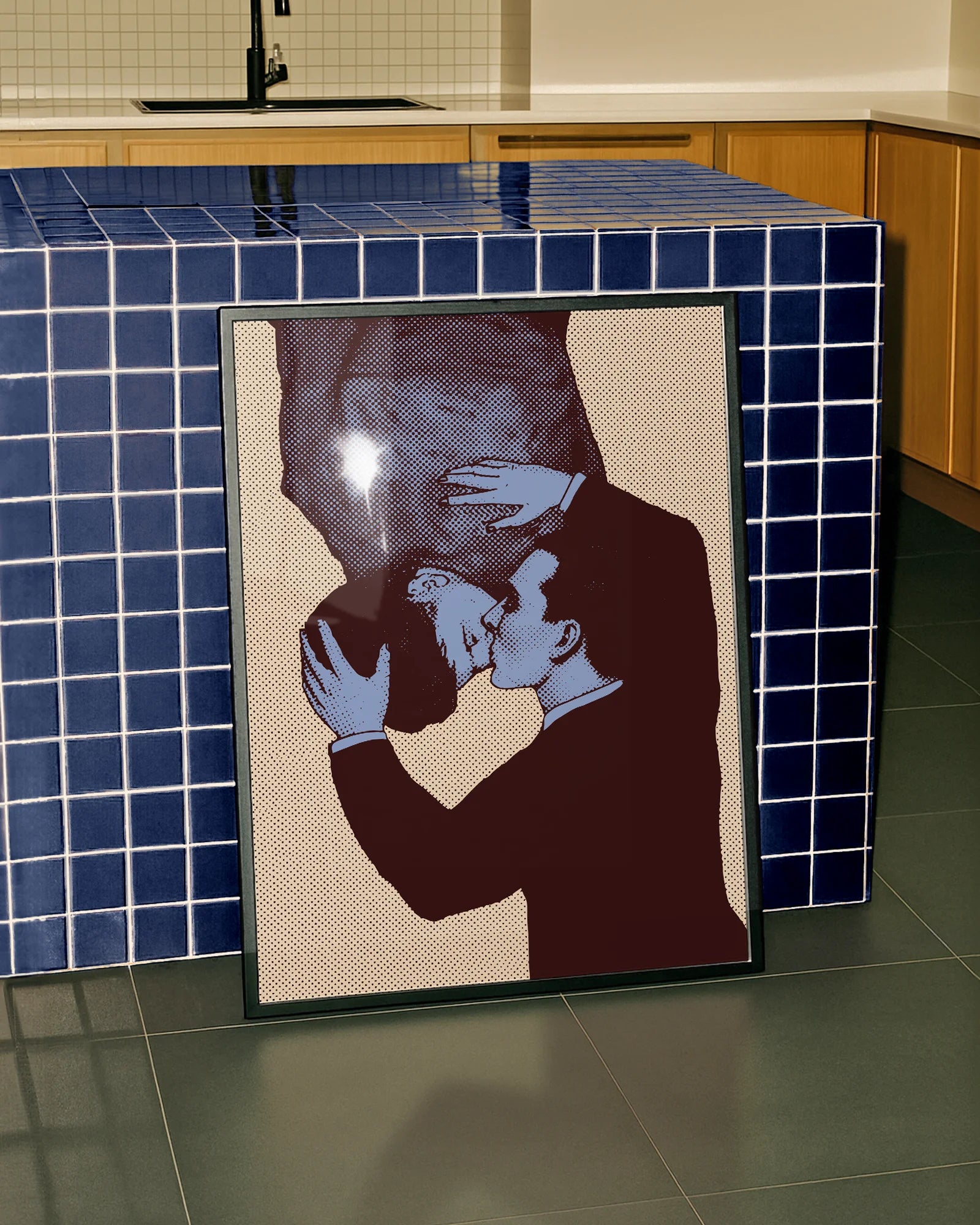 A framed poster with two gay men kissing, pop art style.