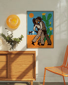 A print with two illustrated kissing cowboys in the wild west.