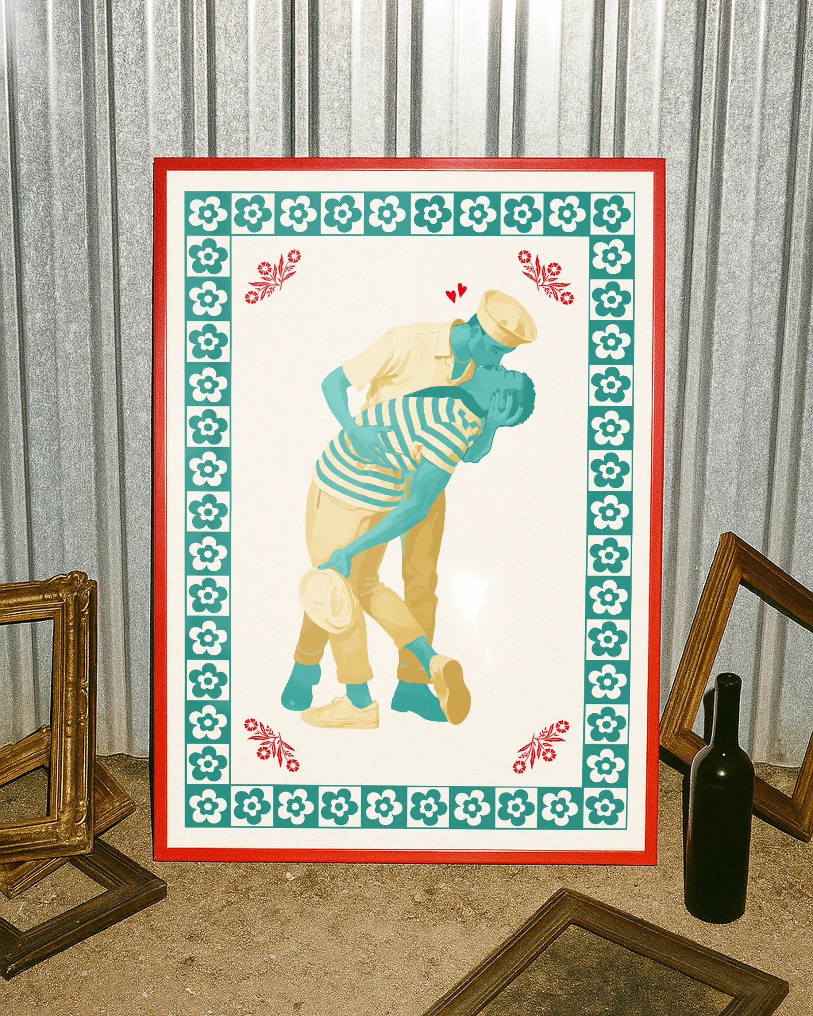 A poster featuring two gay sailor men locked in a passionate kiss, surrounded by a frame of soft flowers.