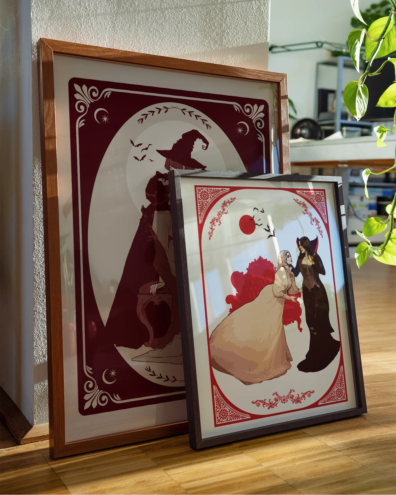 Two posters with a lesbian vampire couple.