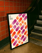 A print with rectangular, gradient shapes in a line, coloured with the lesbian pride flag colours, along the texts '005. The Gradient Collection' and 'Women Love Women'.