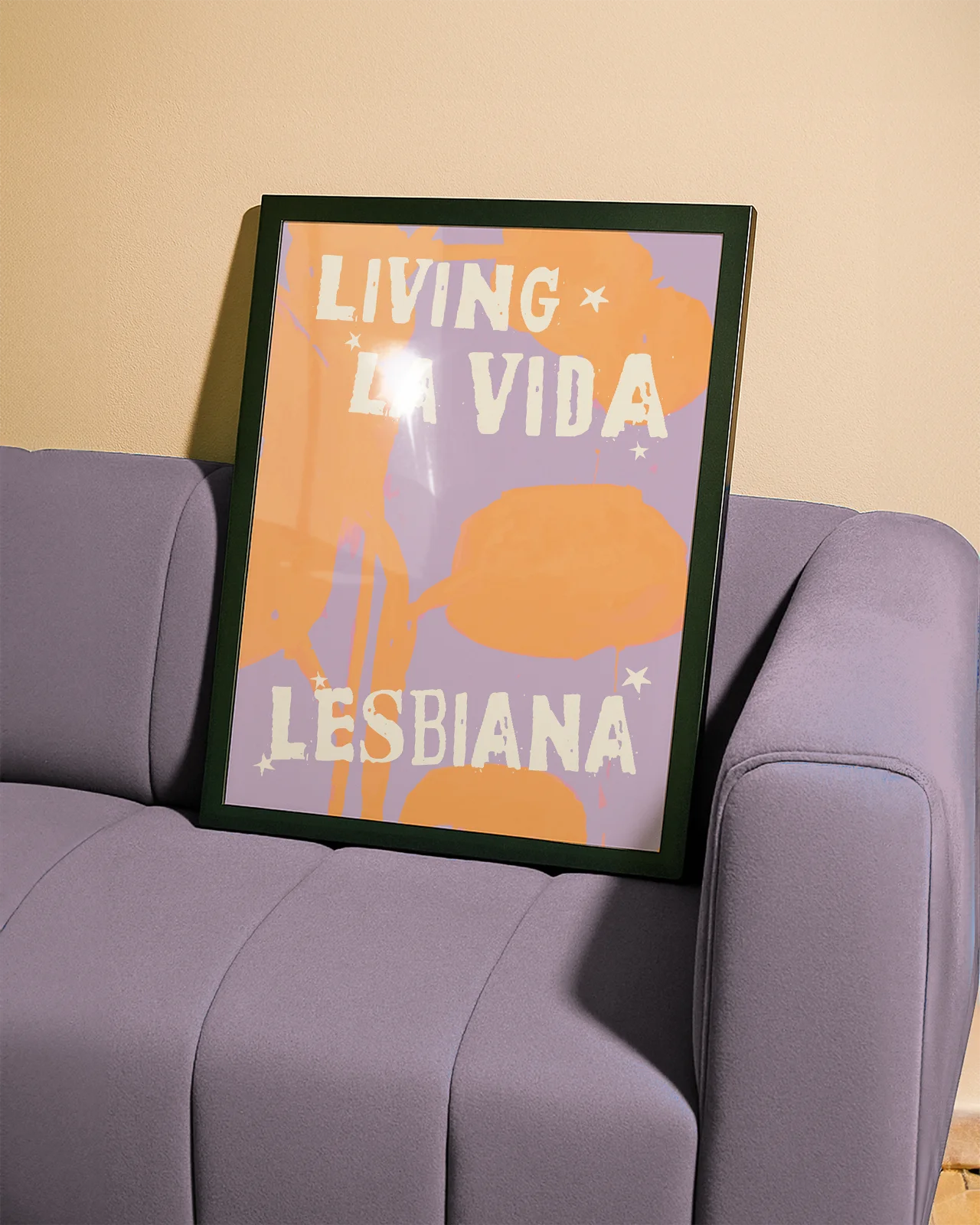 A poster with the text 'LIVING LA VIDA LESBIANA' against an abstract background.
