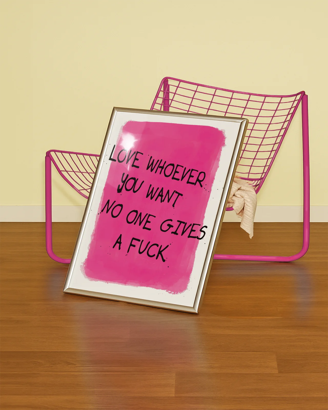 A poster with a text 'Love whoever you want no one gives a fuck', against a pink background.