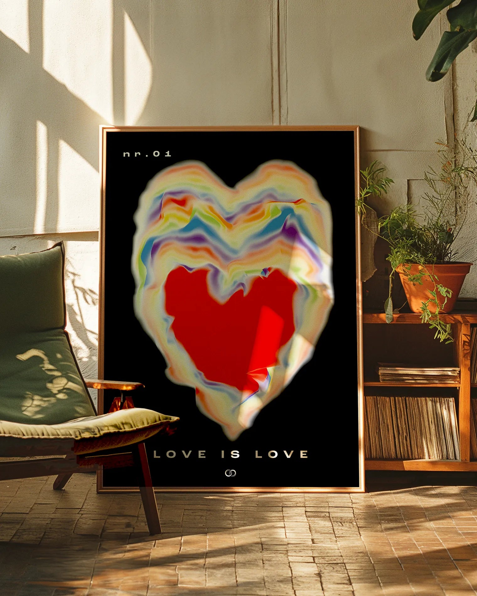 Framed poster with a burning heart in pride rainbow colours with the text 'LOVE IS LOVE'.