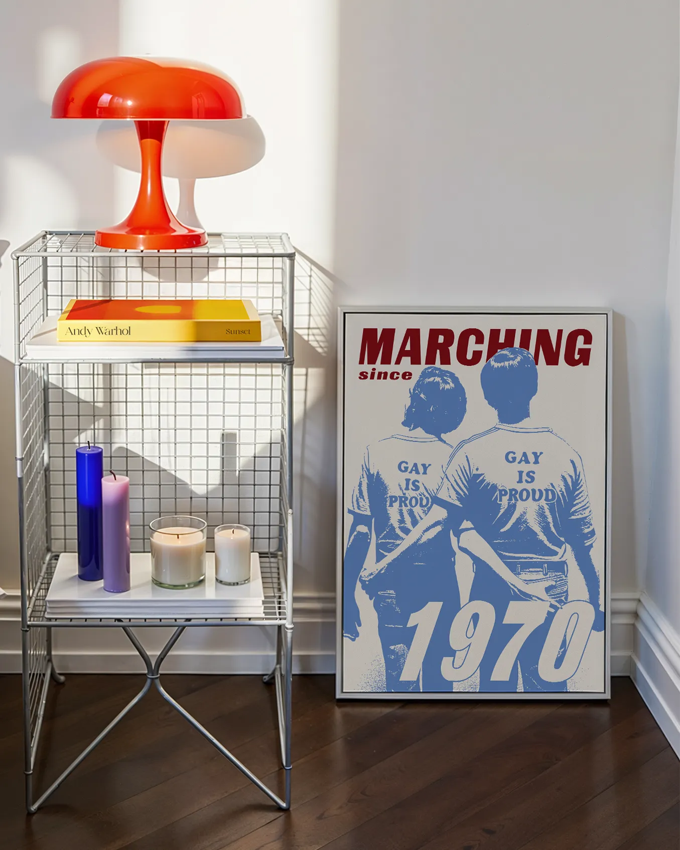 A framed print with an illustrated gay couple walking the first pride parade in New York 1970.