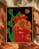A print with two kissing cowboys under a starlit sky.