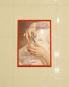 A framed poster featuring a woman trimming her nails with the text: “NAIL HER – with care” and “Trim responsibly, keep it short, for her comfort.”