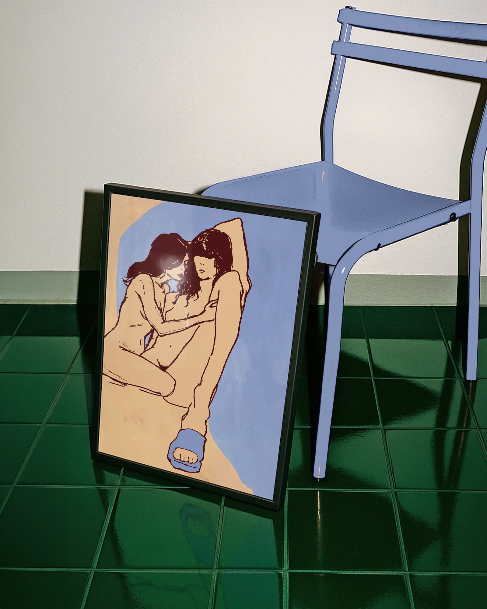 A framed poster with a lesbian, naked couple in an abstract style.