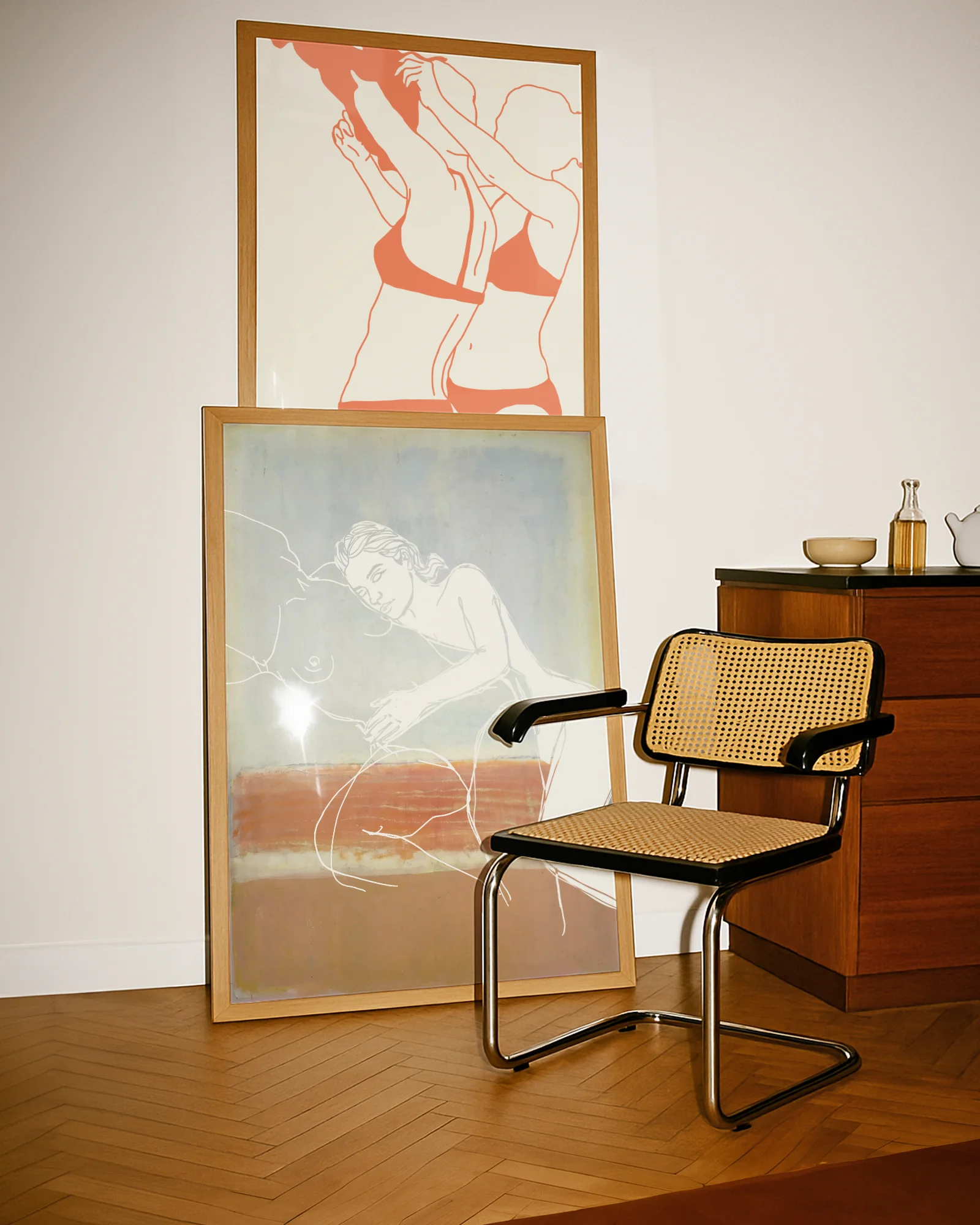 A poster with two, lesbian ladies in a line-art style, laying down and embracing softly.