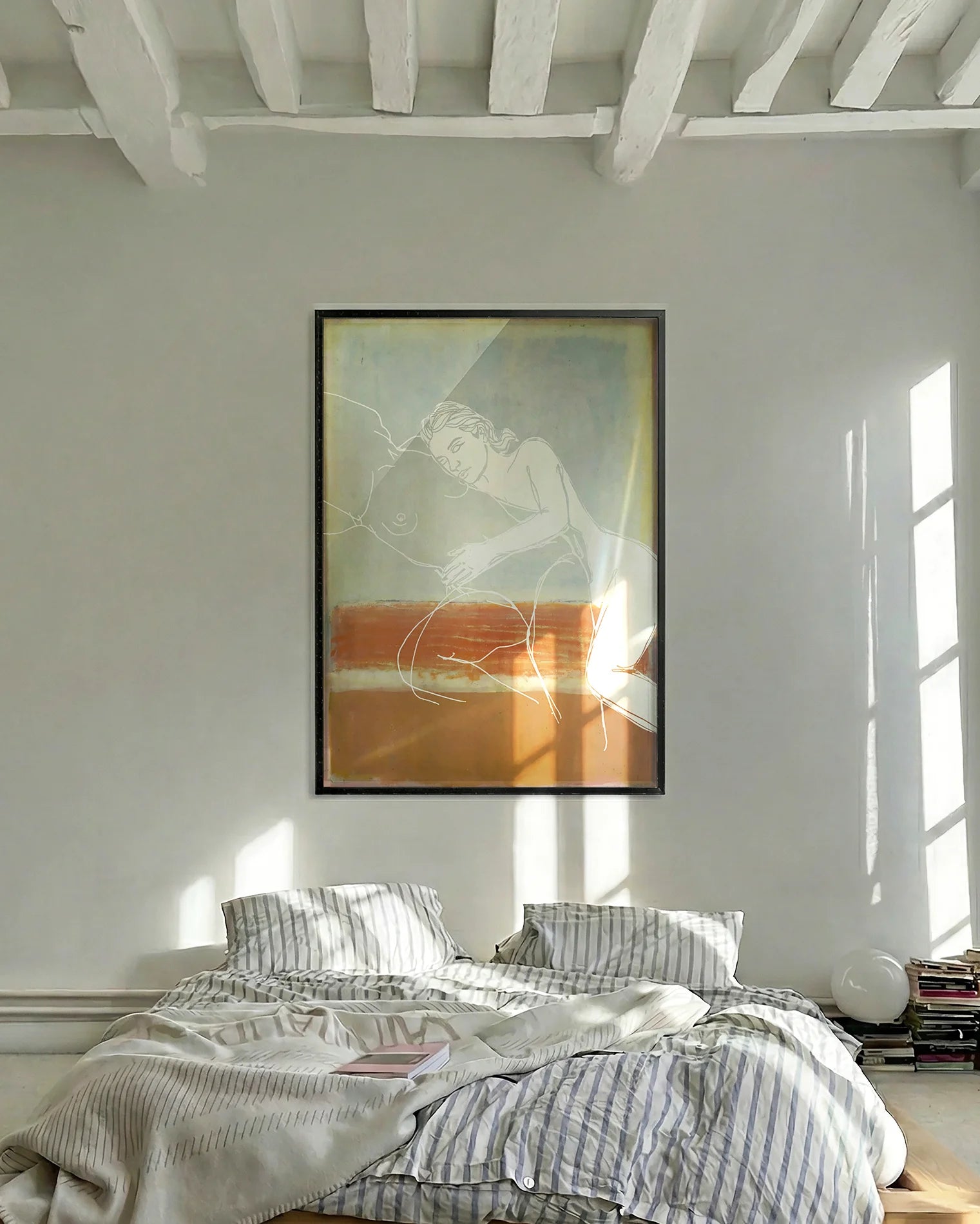 A poster with two, lesbian ladies in a line-art style, laying down and embracing softly.