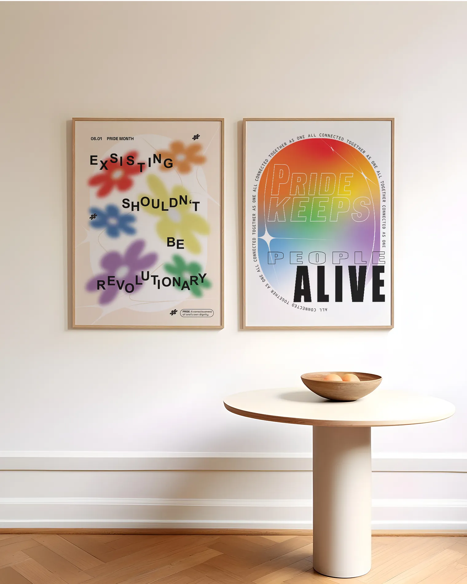 A print with gay pride flowers and the text 'Existing Shouldn't Be Revolutionary'.