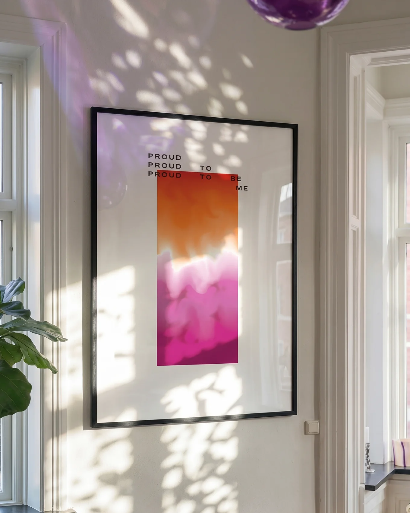 A poster with a gradient lesbian pride flag and the text: 'Proud to be me'.