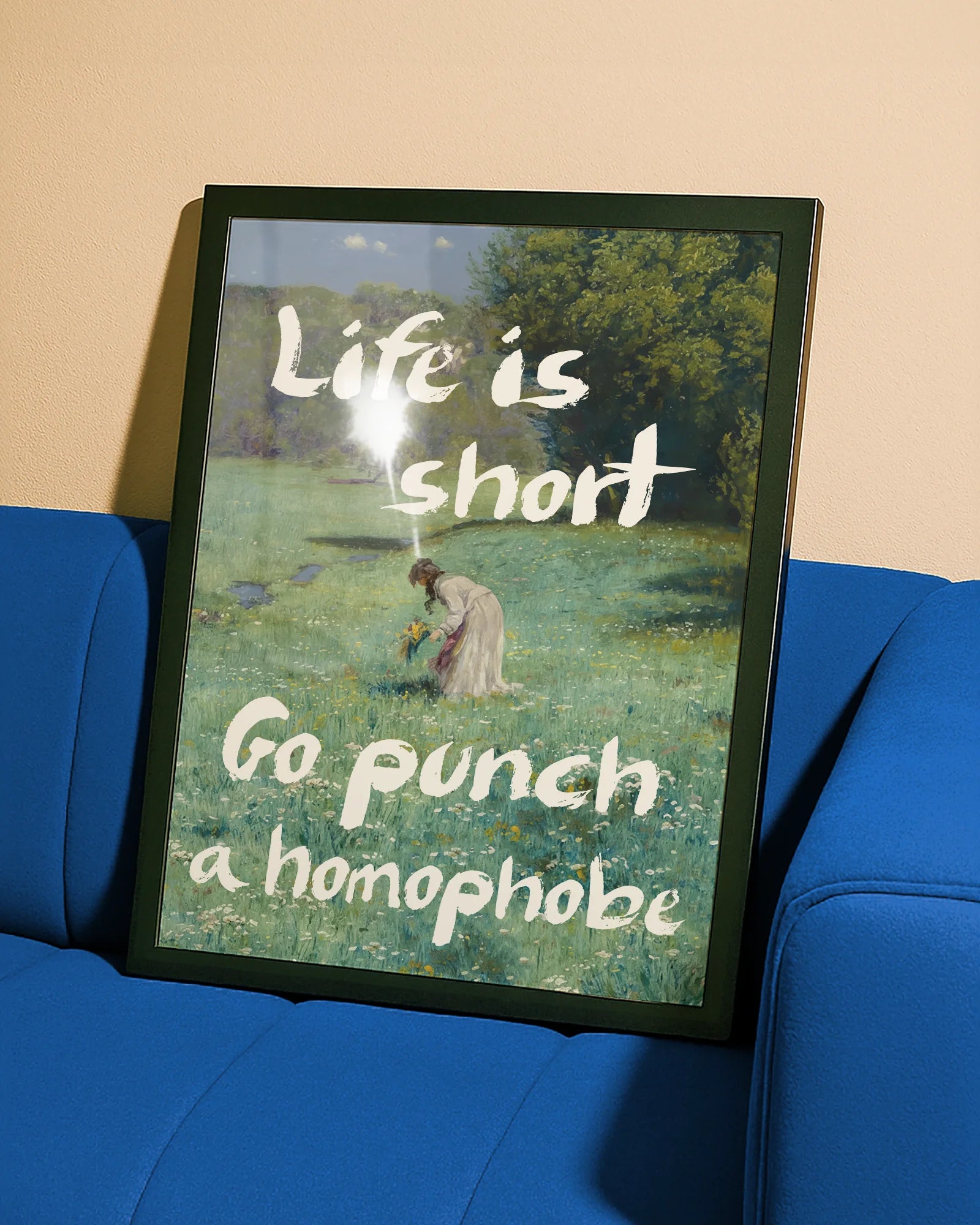 En postern som föreställer en kvinna som plockar blommor i ett öppet fält, i en klassisk oljemålnings-stil med texten 'Life is short Go punch a homophobe".
