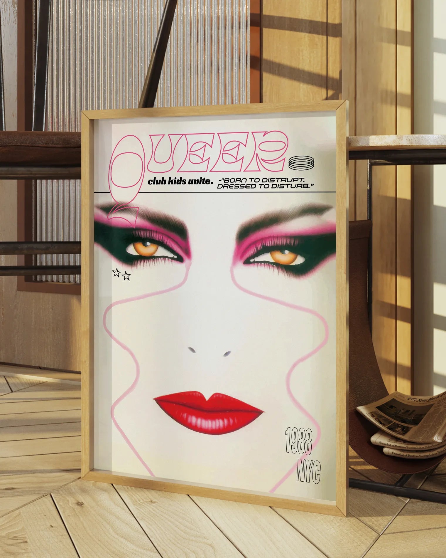 A print with an illustrated face with makeup and the text 'Queer Club Kids Unite'.