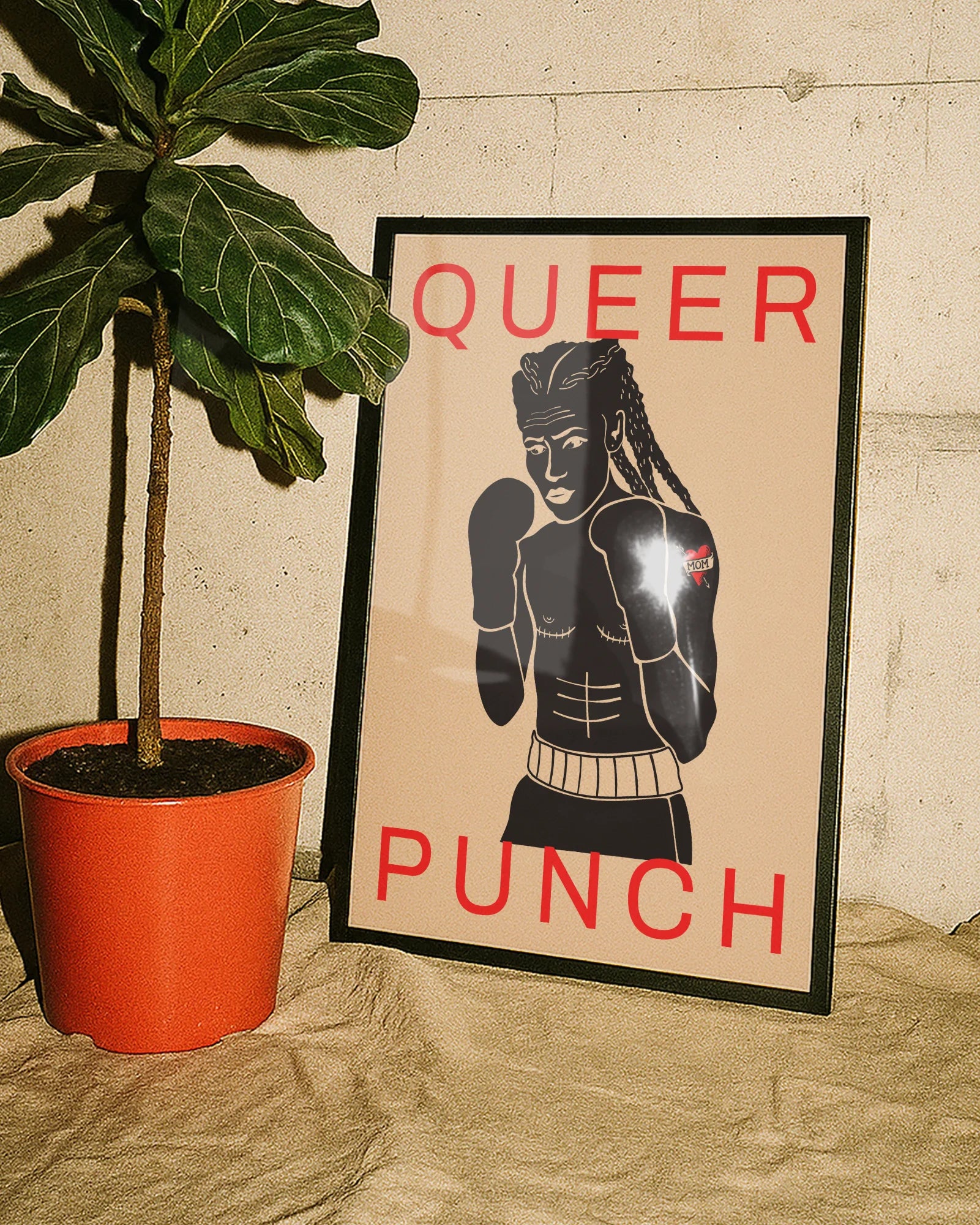 A poster featuring a queer person with a bare chest and boxing gloves, alongside the text: "QUEER PUNCH."