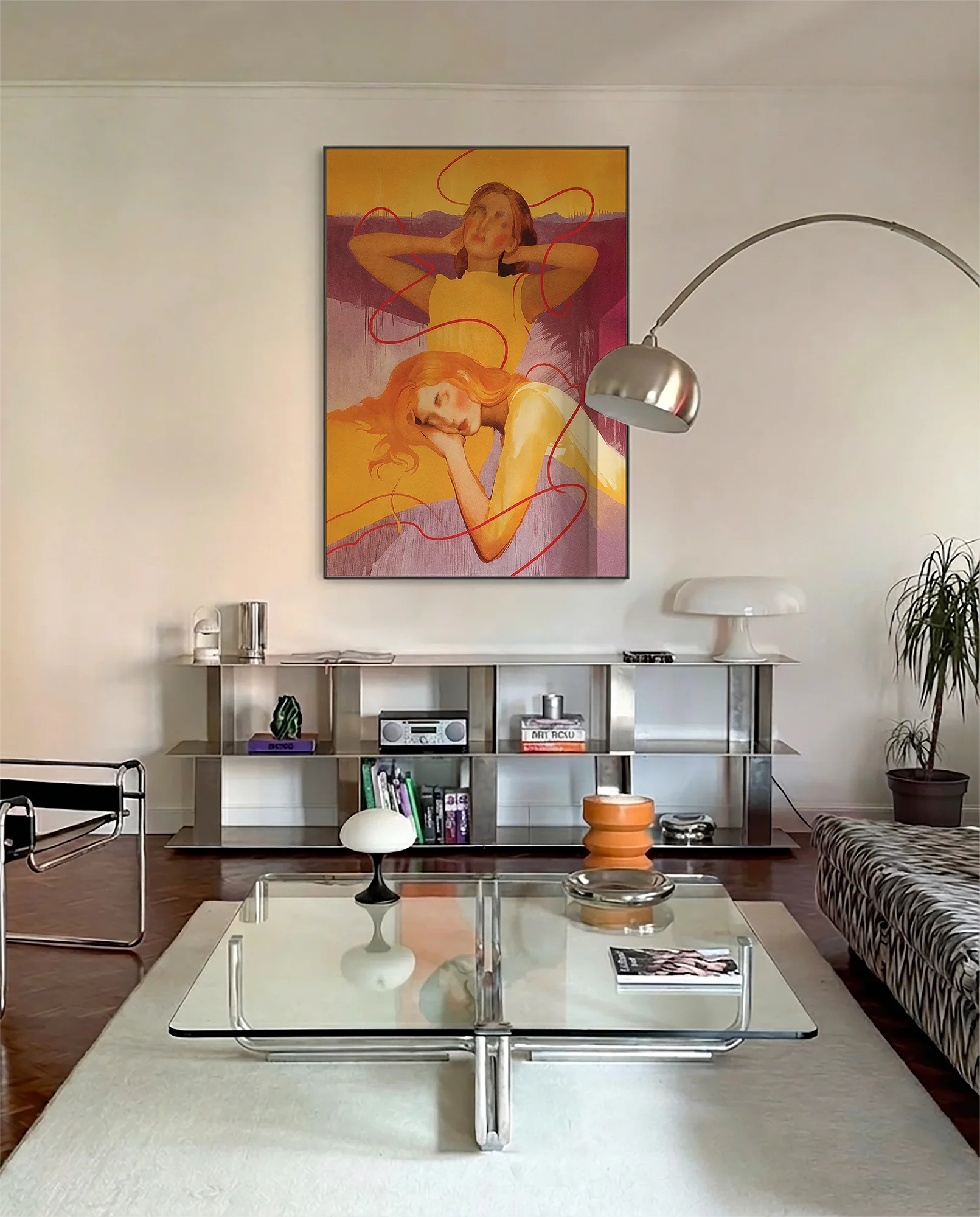 A framed poster with a lesbian, abstract couple.