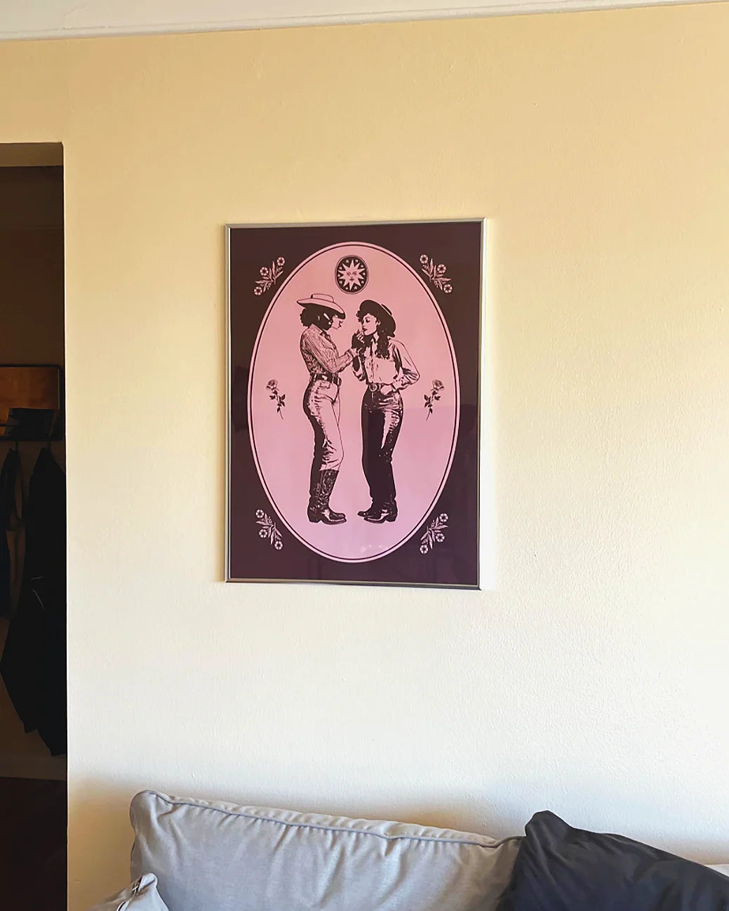 Customer review photo of framed poster on wall.