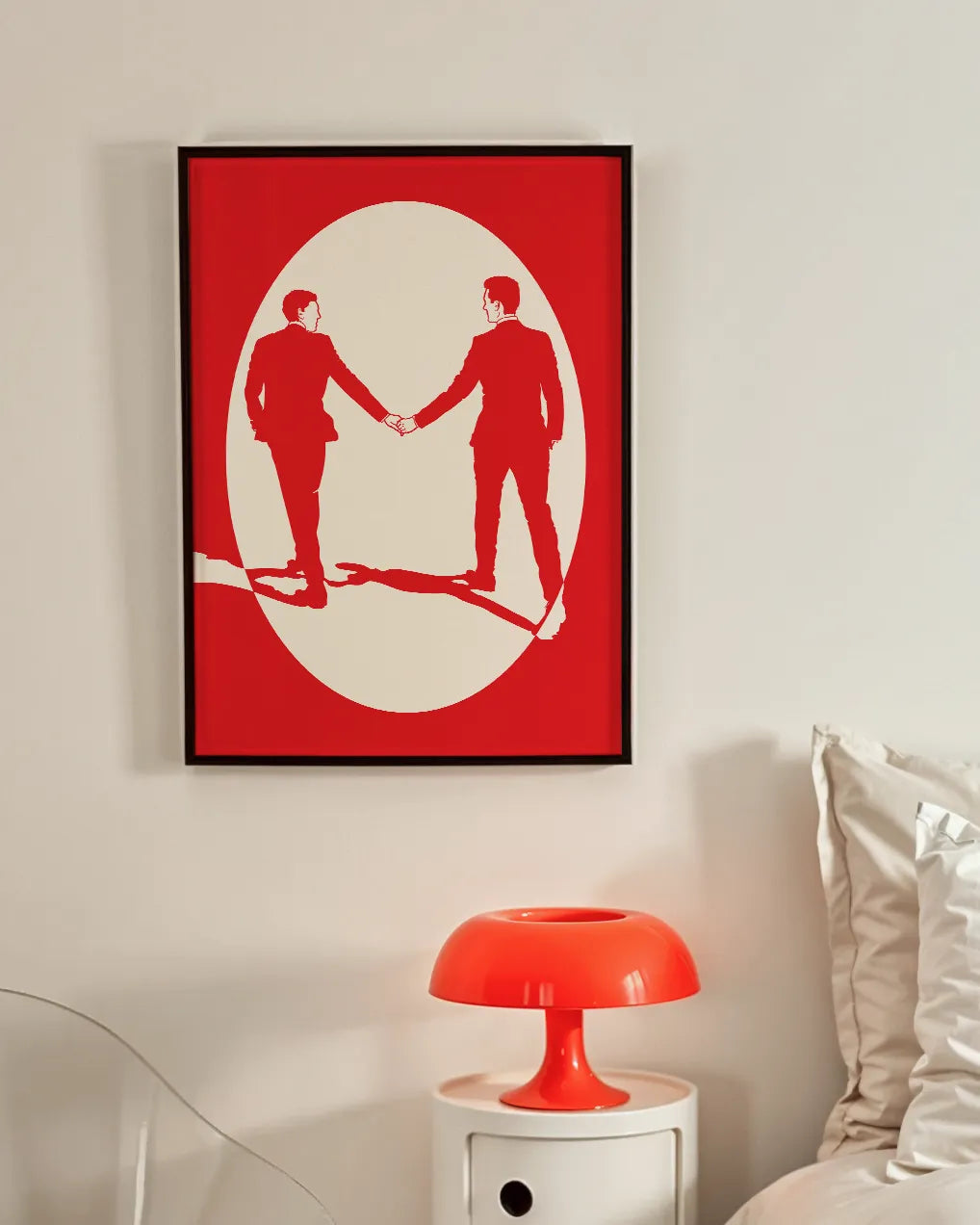 A print with an illustrated male couple in suits, walking hand in hand against a red background.