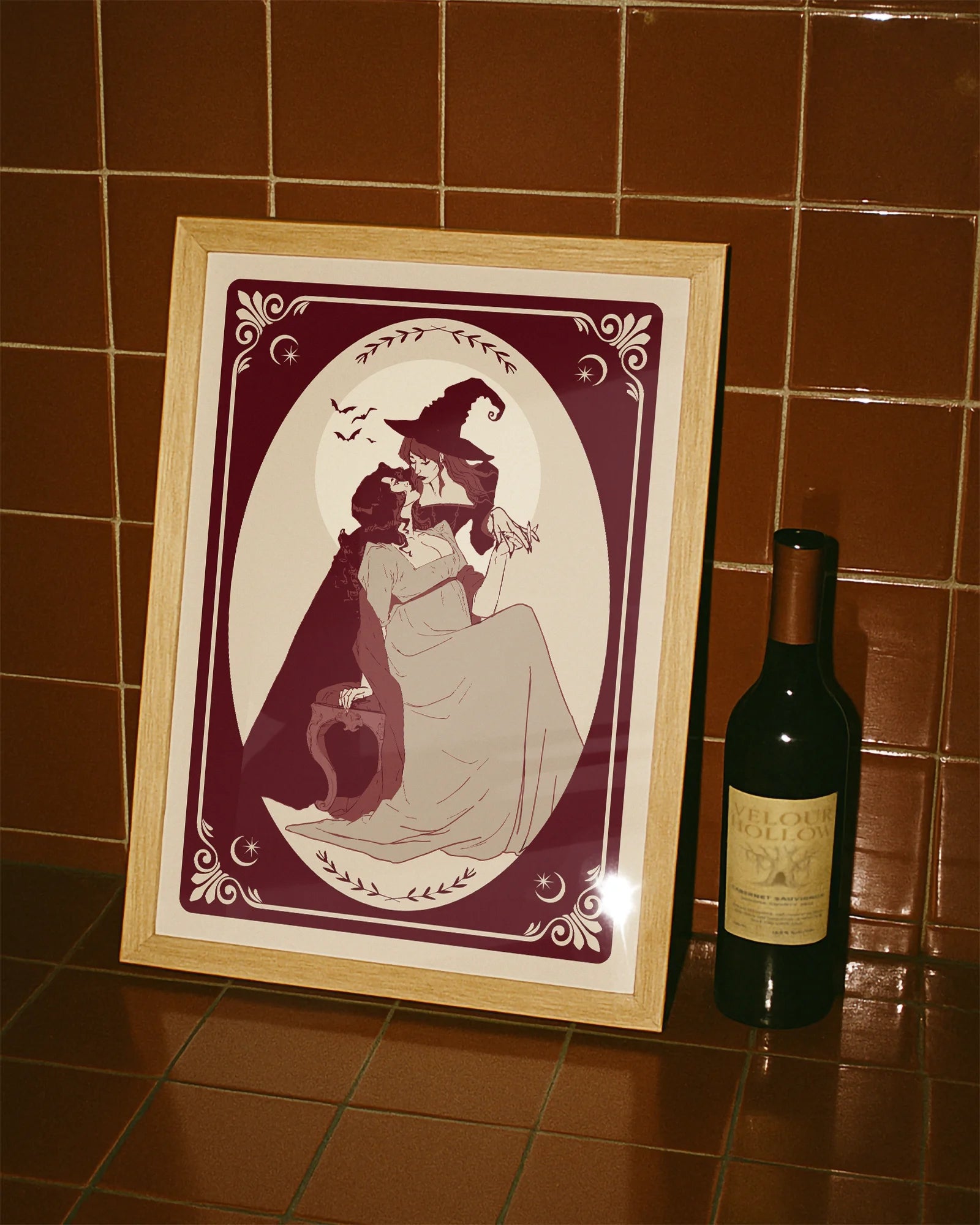 A poster with two lesbian witches kissing.