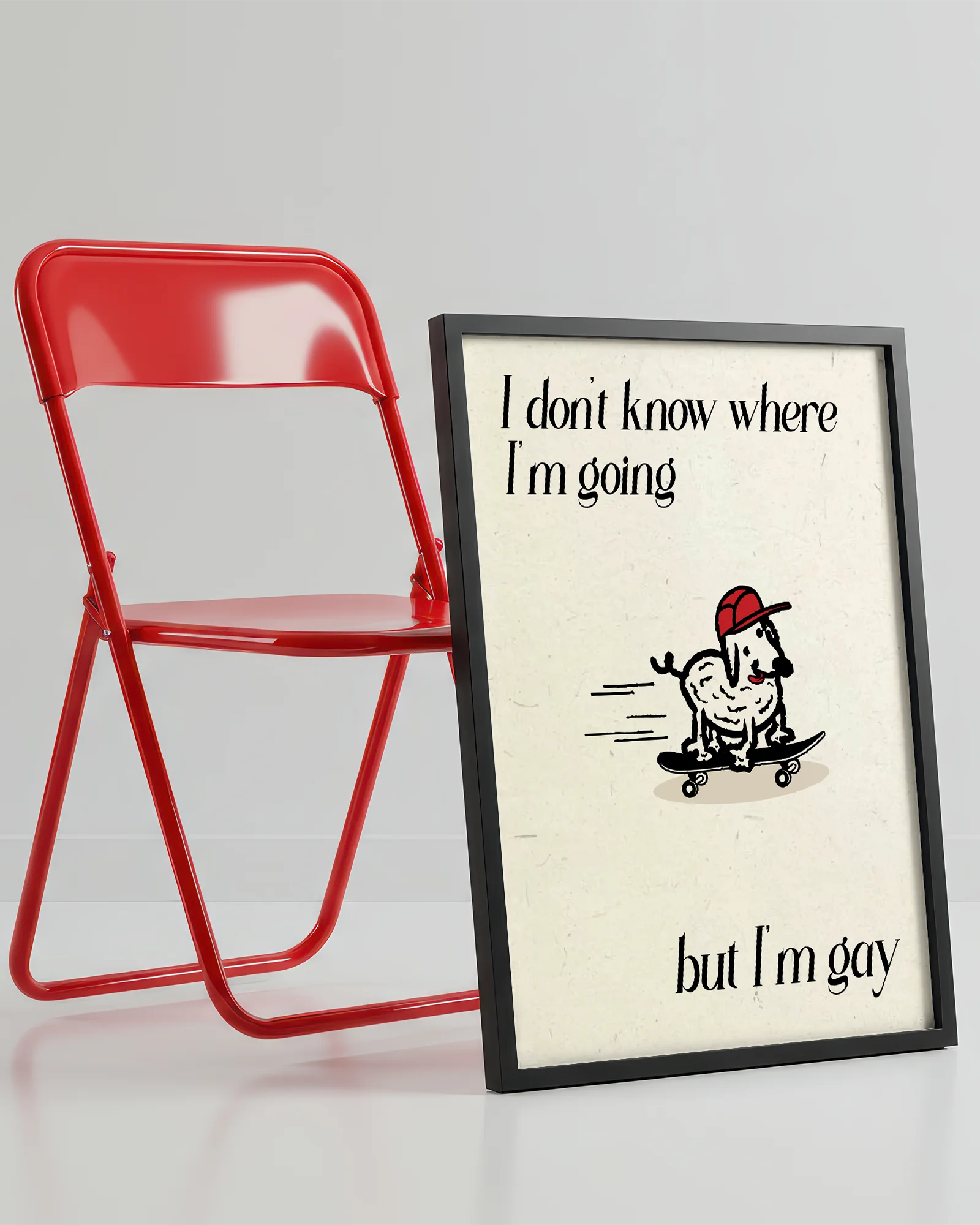 A framed poster with a cute, curly dog on a skateboard with the text 'I don't know where I'm going but I'm gay.