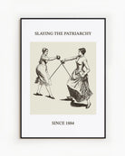The poster features two women fencing, with the text: “SLAYING THE PATRIARCHY SINCE 1884.”
