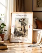 A poster featuring a charming butch dyke in a suit and hat, with the text 'FEEL SAFE AT NIGHT, SLEEP WITH A BUTCH'.