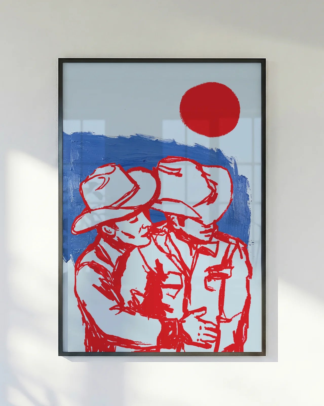 A poster with two ay cowboys hugging in front of a red sunset.
