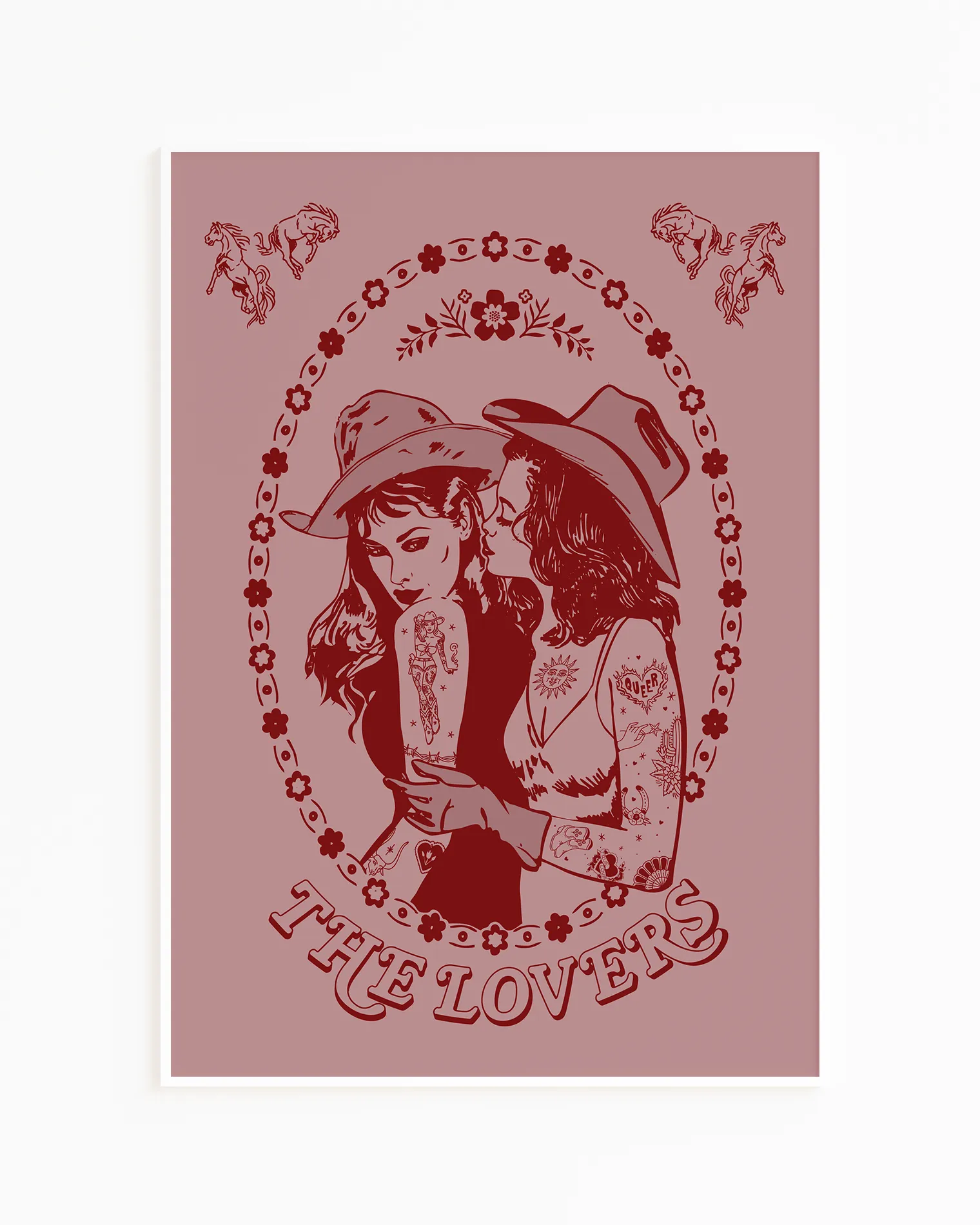 A print with a lesbian cowgirl couple kissing with the text 'The Lovers'.