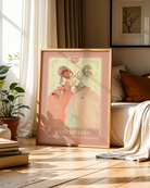 A print with a sapphic couple kissing in a tarot-style, 1700's era, with the text 'The Lovers'.
