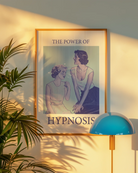 A poster with a woman staring unabashedly and fascinated at another woman’s chest, with the text: ‘THE POWER OF HYPNOSIS.