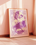 A print with an illustrated, lesbian couple in the 60's dancing, with the text 'THE DANCERS'.